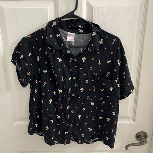 Black mushroom shirt.